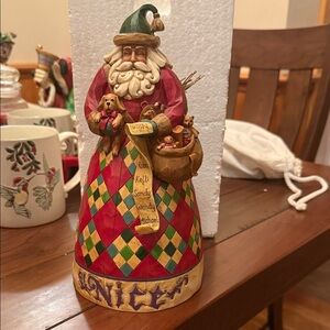 Naughty and nice Santa Figurine with Red and Green Accents